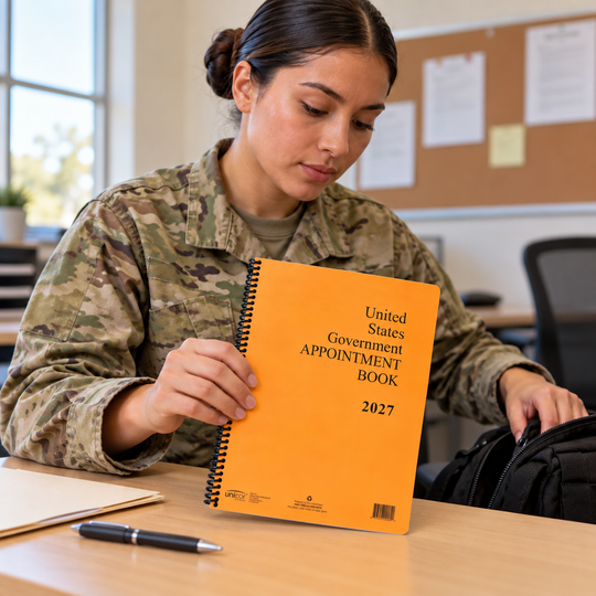 Service member placing an orange spiral-bound UNICOR 2027 appointment book into a work bag